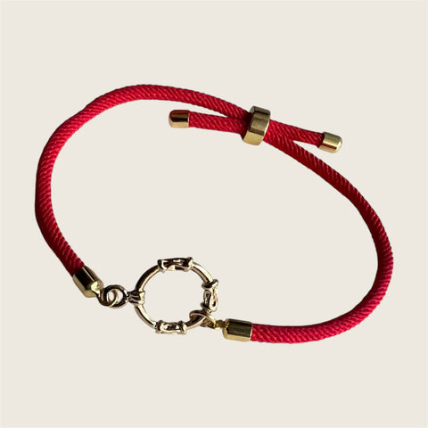 ROTES NYLON- UND MESSING-ARMBAND